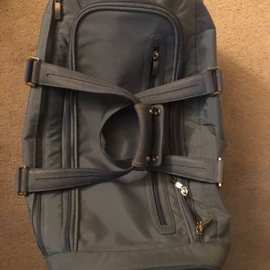 Tumi duffel roller